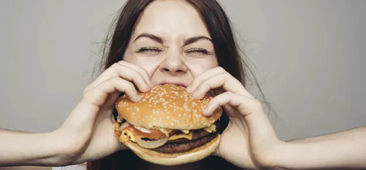 Girl eating a burger