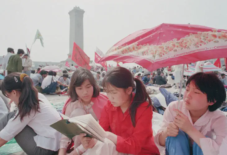 women read book together